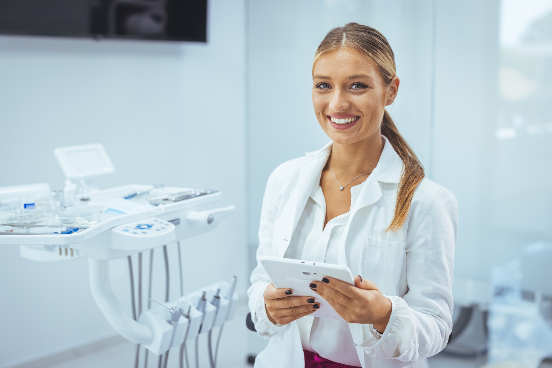 Portrait of female dentist.